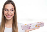 Woman holding a Lizush Mom luxury spa gift set
